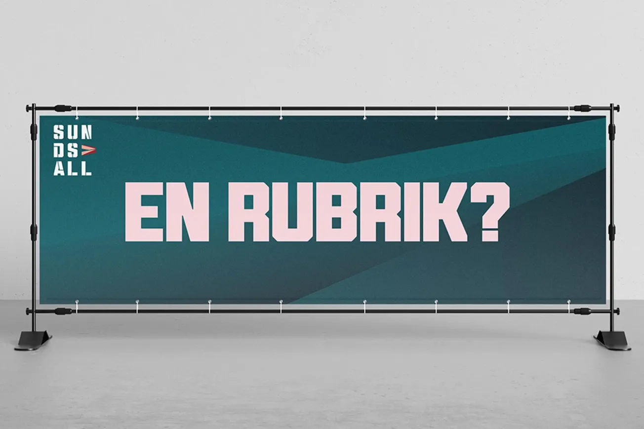 en avlång skylt med textne "en rubrik?"