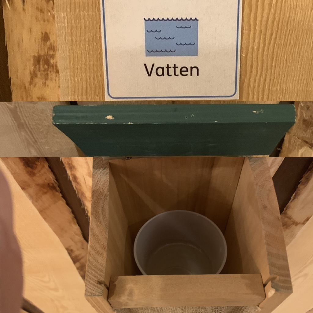En trälåda med en skål inuti.
