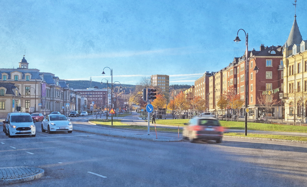 En illustration av två åttakantiga byggnader som syns i fjärran som en del av stadssiluetten.